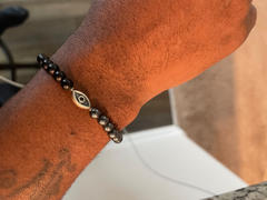 Karma and Luck Stay Grounded -  Hematite Matte Onyx Evil Eye Charm Bracelet Review