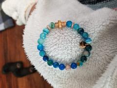 NOGU St. Lily of the Mohawks | Rose Gold Cross | Blue Striped Agate Bracelet Review