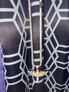 The GUU Shop Baguette Iced Cross With Wing Necklace Review