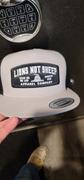 Lions Not Sheep Lions Not Sheep Lead From the Front Trucker Hat (Mesh Back - Silver/Black) Review