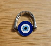 CONQUERing Evil Eye Novelty Element Review