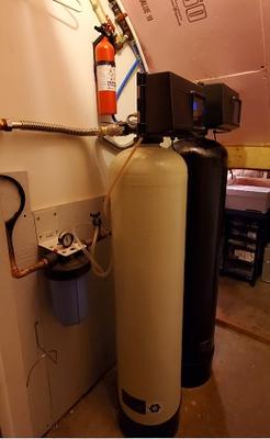 Close-up of iron filter and water softener installation