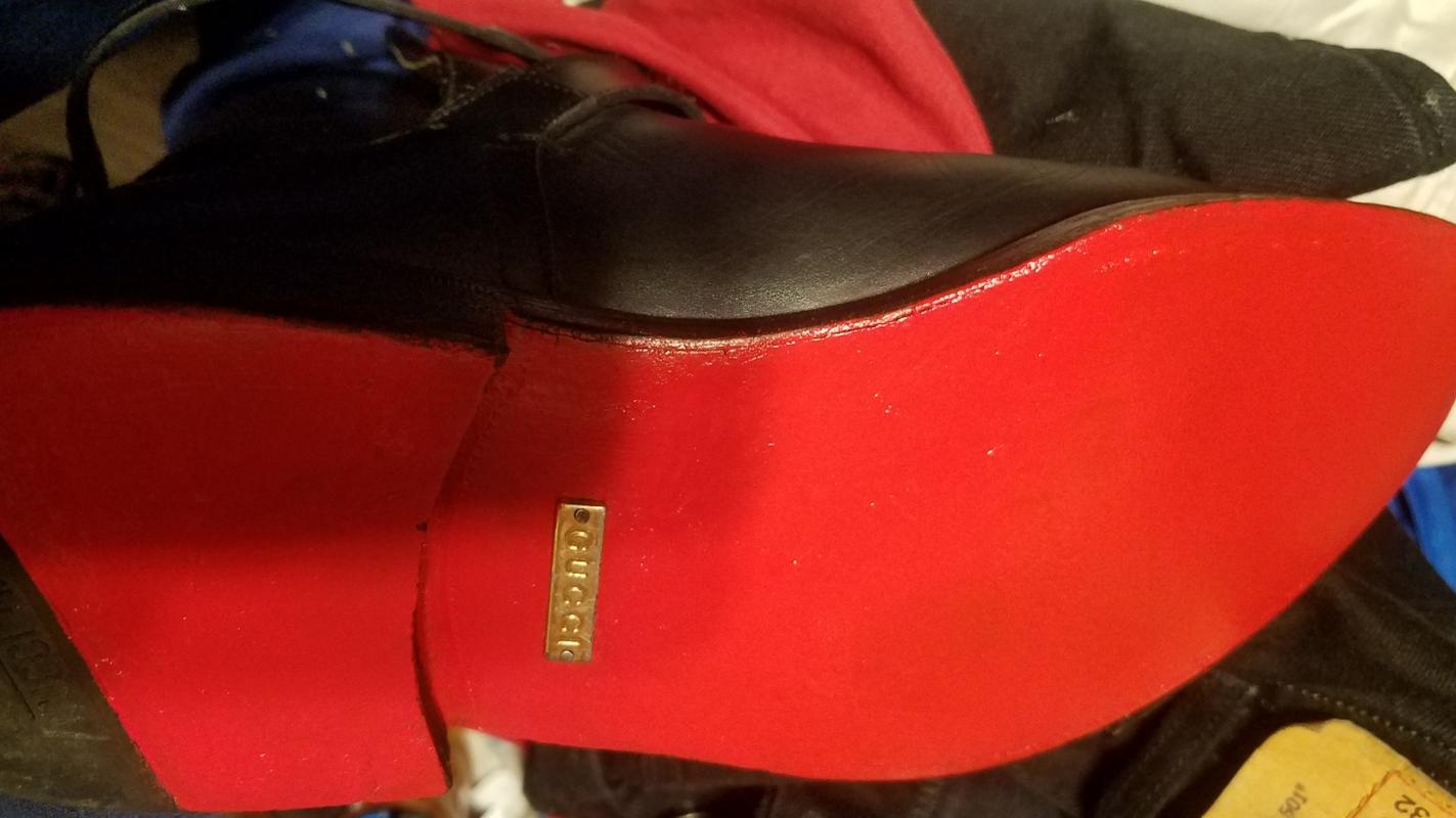 red bottom shoe paint