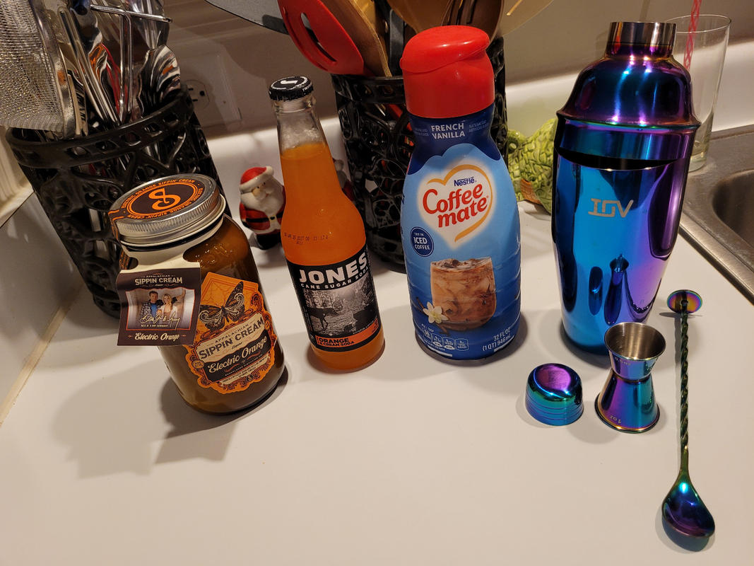 Buy Sugarlands Shine Electric Orange Sippin' Cream | Sugarlands