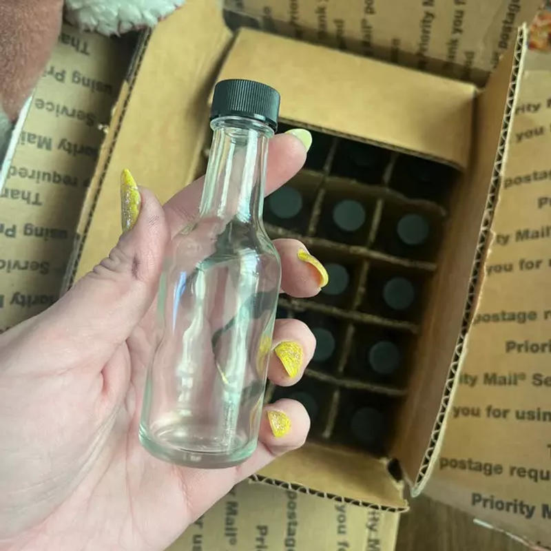 50 ml Round Liquor Glass bottle with Black Cap - 1.7 oz Woozy | Beverage &  Liquor Bottles