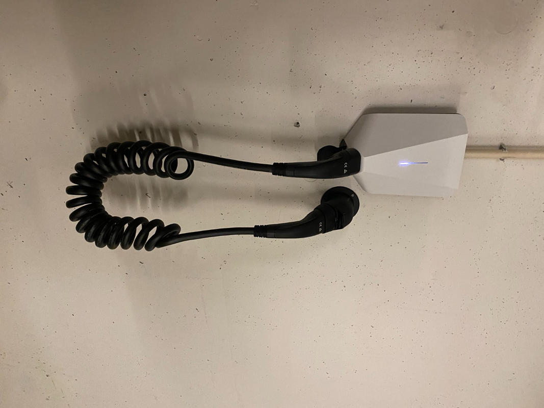 Angled wall holder for Type 2 plug