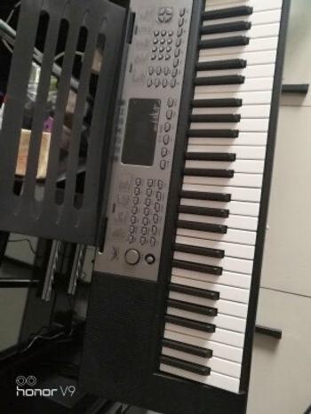 Ukunili Ukulele E-store Angelet 61 Keys Electronic Keyboard Piano Led Light  XTS-690F Review