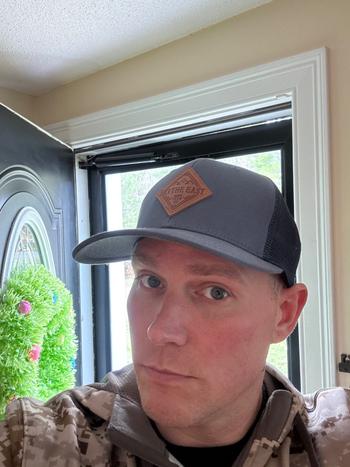 Ski The East Born From Ice Canvas Trucker Hat - Storm Review