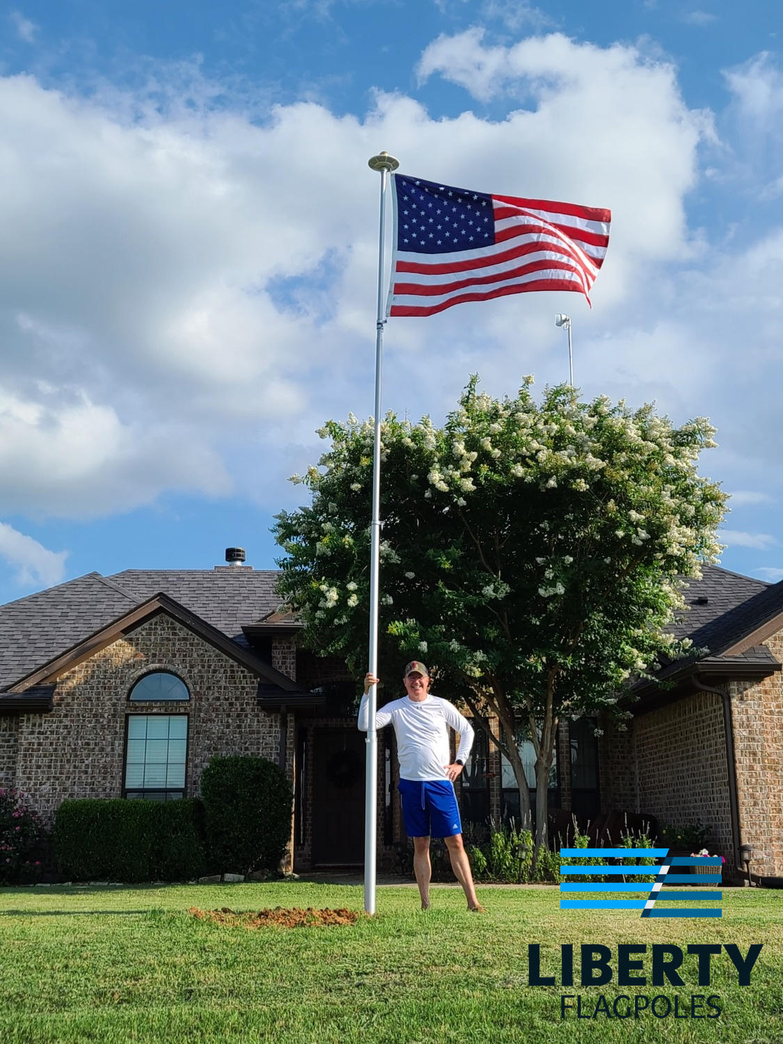 HD telescoping flagpole installed at a residence — Made in USA
