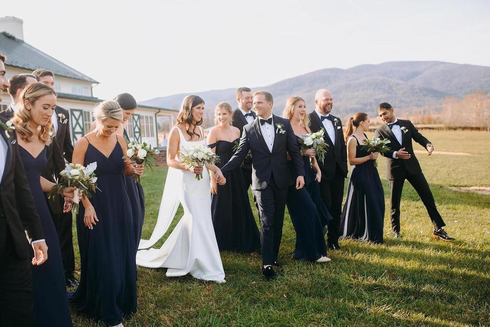 Nothing like being surrounded by your amazing Bridesmaids and Groomsmen on your Wedding Day❤️
Photo and Video: samias_studios
Coordinator: about_thyme_events
Caterer: thelocalcatering
Wedding Shop: garnishboutique
Dress: janehillbridal
Veil: untamedpetals
Rentals: mseventscville
Hair/Makep: ave42salon
Florals: fadedpoppy
Bridesmaids' Dresses: birdygrey
Groomsmen's Tuxes: theblacktux
Stationary: mintedweddings
Transportation: Easy Riders Bus Company/A&A Limousine
Cake: malihacreations
Donut Truck: carpedonut
DJ: bunndjrva
.
.
.
.
#kingfamilyvineyards #kfv #vawedding #cvillewedding #wedding #theknot #virginiabride #vaweddingvenue #roselandfarm #brideandgroom #dreamwedding #southernweddings #weddinginspiration #vineyardwedding
