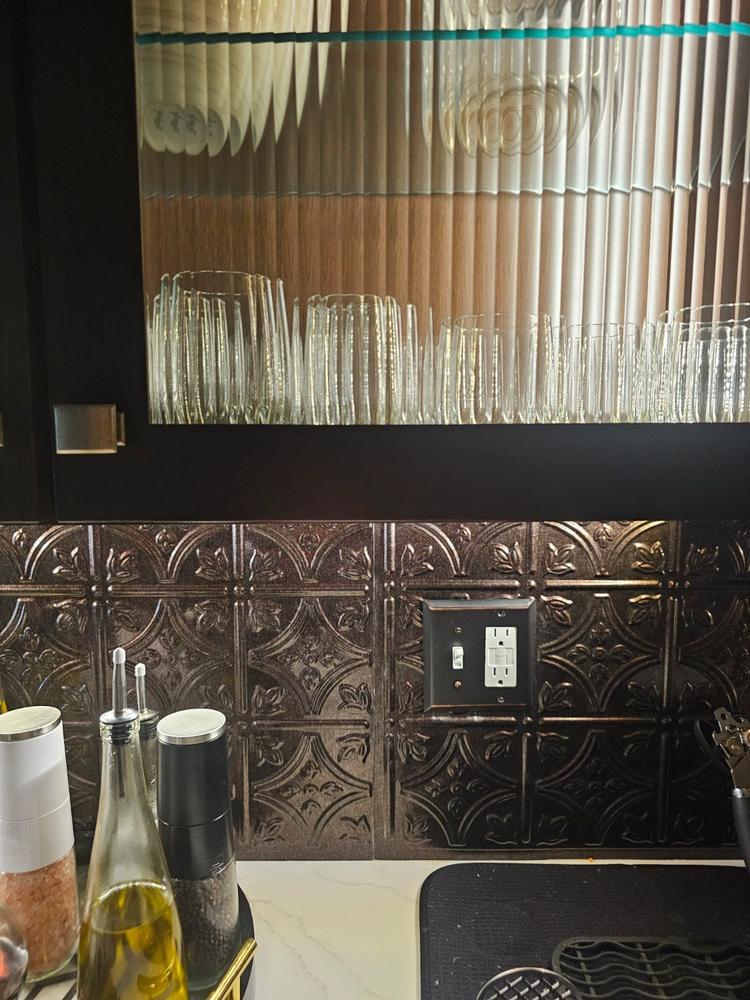 Century Aged Bronze Steel - 1 Rocker / 1 Duplex Wallplate - Customer Photo From Diana R.