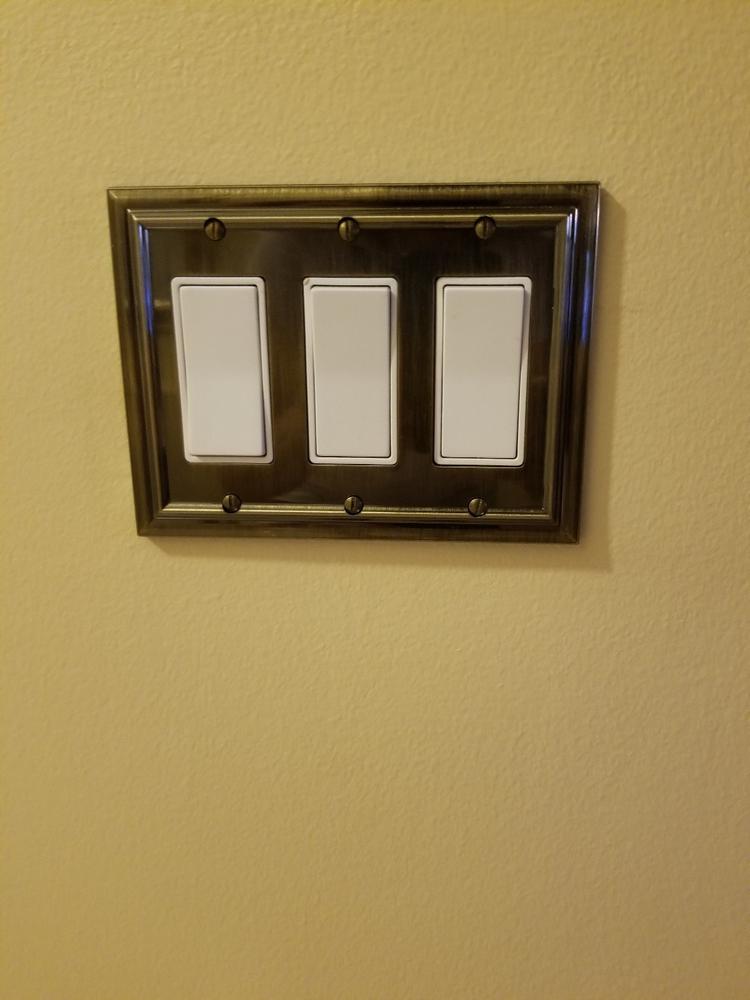 Continental Brushed Brass Cast - 3 Rocker Wallplate - Customer Photo From Joan S.