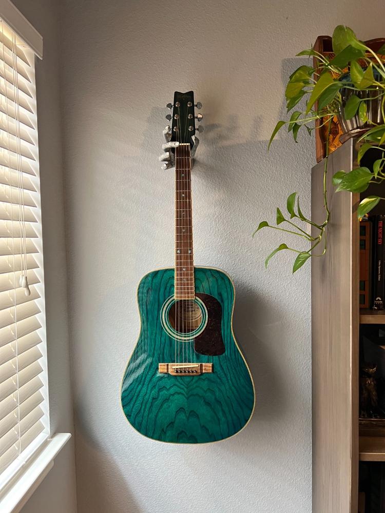 The Valkyrie White Cracked Guitar Hanger - Right - Customer Photo From Rey Muniz