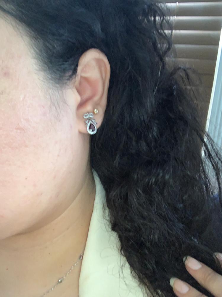 Enchanted Disney Fine Jewelry Sterling Silver with 1/4 CTTW Diamond and Garnet Snow White Bow Earrings - Customer Photo From Vanessa C.