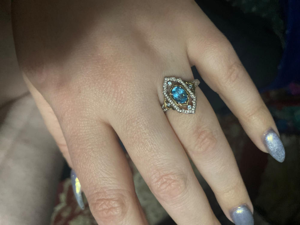 Enchanted Disney Fine Jewelry Sterling Silver and 10K Yellow Gold 1/5 CTTW Diamond and Swiss Blue Topaz Jasmine Ring - Customer Photo From Kathryn B.