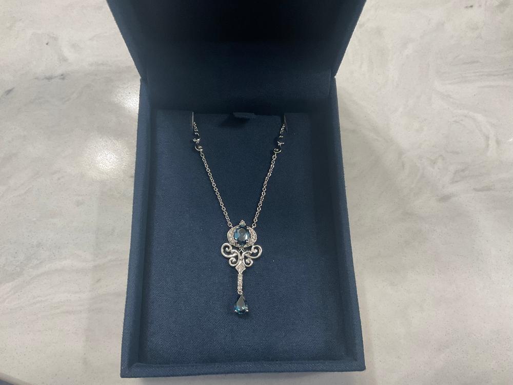 Enchanted Disney Fine Jewelry Sterling Silver with 1/10 CTTW Diamond and London Blue Topaz Cinderella Necklace - Customer Photo From Anonymous
