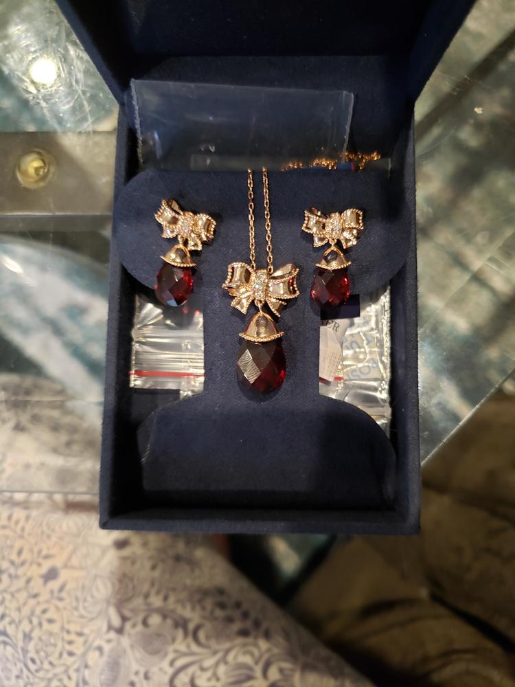 Enchanted Disney Fine Jewelry 14k Rose Gold 1/15 CTTW Diamond and Garnet Snow White Bow Earrings - Customer Photo From Luffy