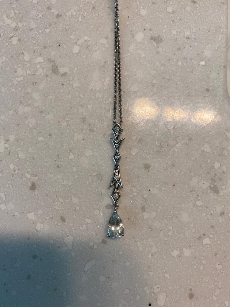 Enchanted Disney Fine Jewelry Sterling Silver with 1/10 CTTW Diamond and Aquamarine Elsa Pendant Necklace - Customer Photo From Alexandra Bryan