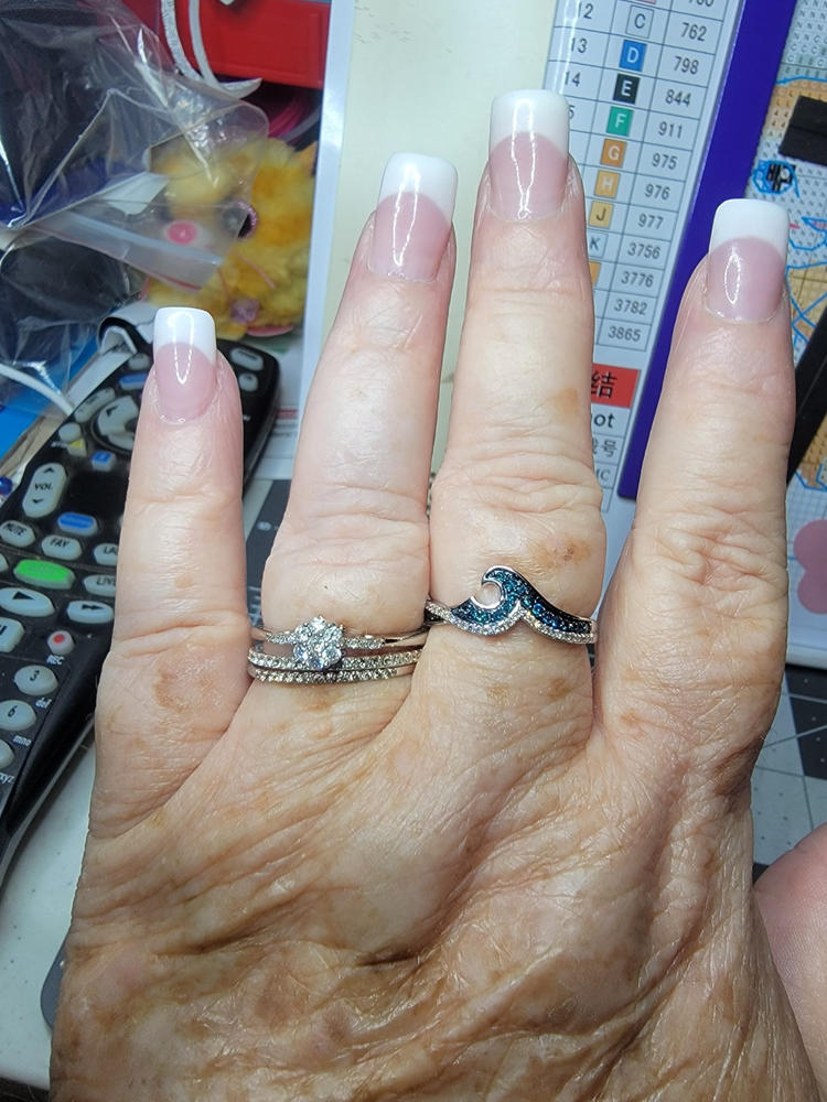 Enchanted Disney Fine Jewelry Sterling Silver with 1/4 CTTW Blue and White Diamond Moana Wave Ring - Customer Photo From LeAnna R.