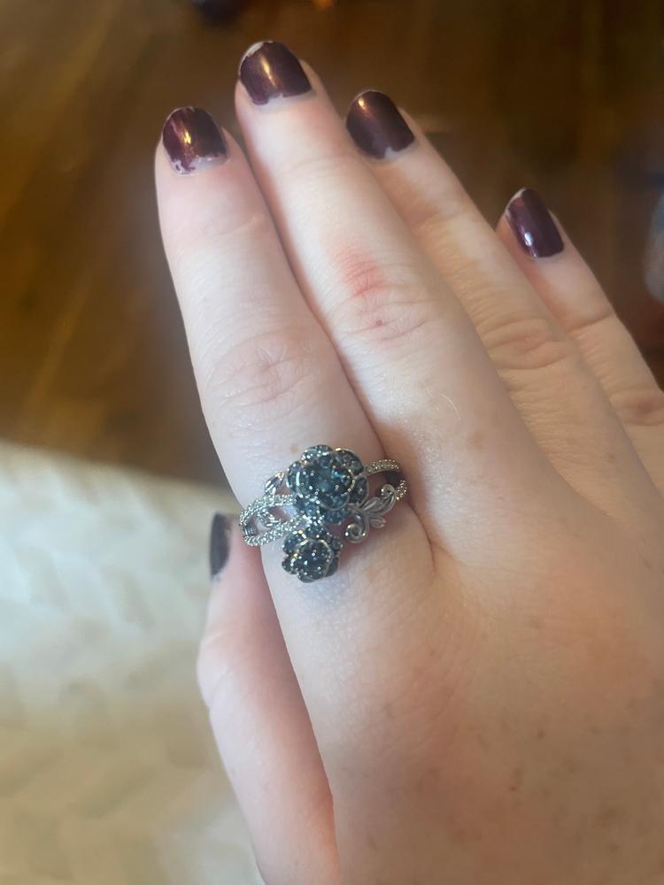 Enchanted Disney Fine Jewelry Sterling Silver with 1/6 CTTW Diamond and London Blue Topaz Cinderella 70th Gardenia Flower Ring - Customer Photo From Cheyenne F.