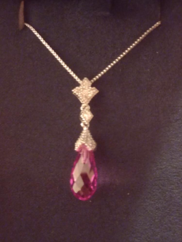 Enchanted Disney Fine Jewelry Sterling Silver with 1/10 CTTW Diamonds and Cr. Pink Sapphire Aurora Pendant Necklace - Customer Photo From Glenda C.