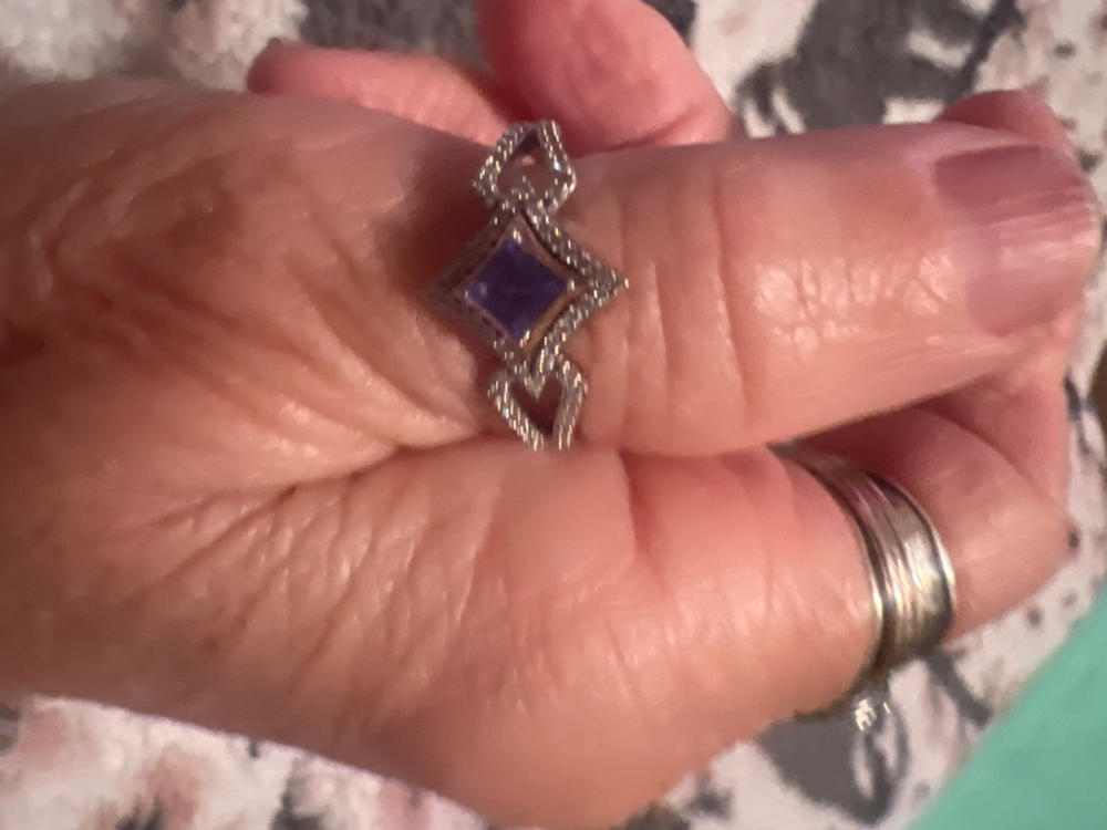 Enchanted Disney Fine Jewelry Sterling Silver and 10K Rose Gold with 1/5 CTTW Diamonds and Tanzanite Majestic Princess Ring - Customer Photo From Kathy Anne Bishop