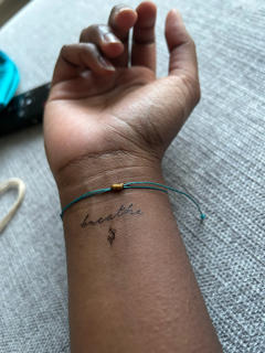 Tiny Sanskrit Symbol for Breathe Temporary Tattoo - Set of 3 - Customer Photo From N. Verboven