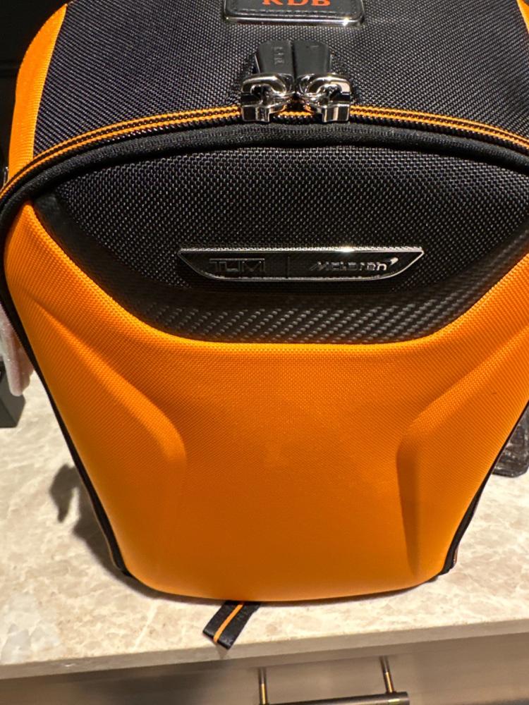 Tumi orange online backpack