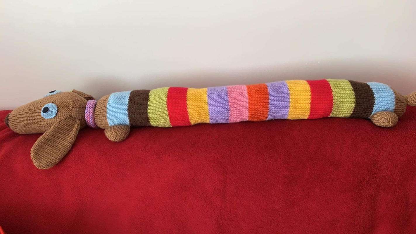 Sausage Dog Draught Excluder by Amanda Berry in Deramores Studio DK