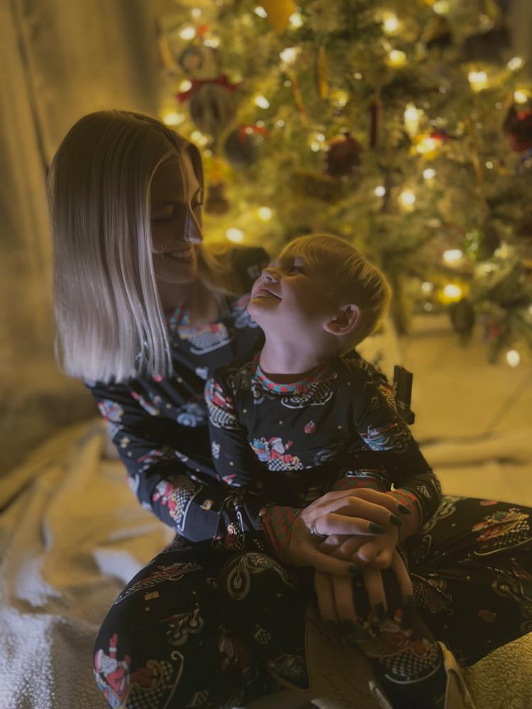 Santas Speedy Sleigh Unisex Pajamas - Customer Photo From Myriah B