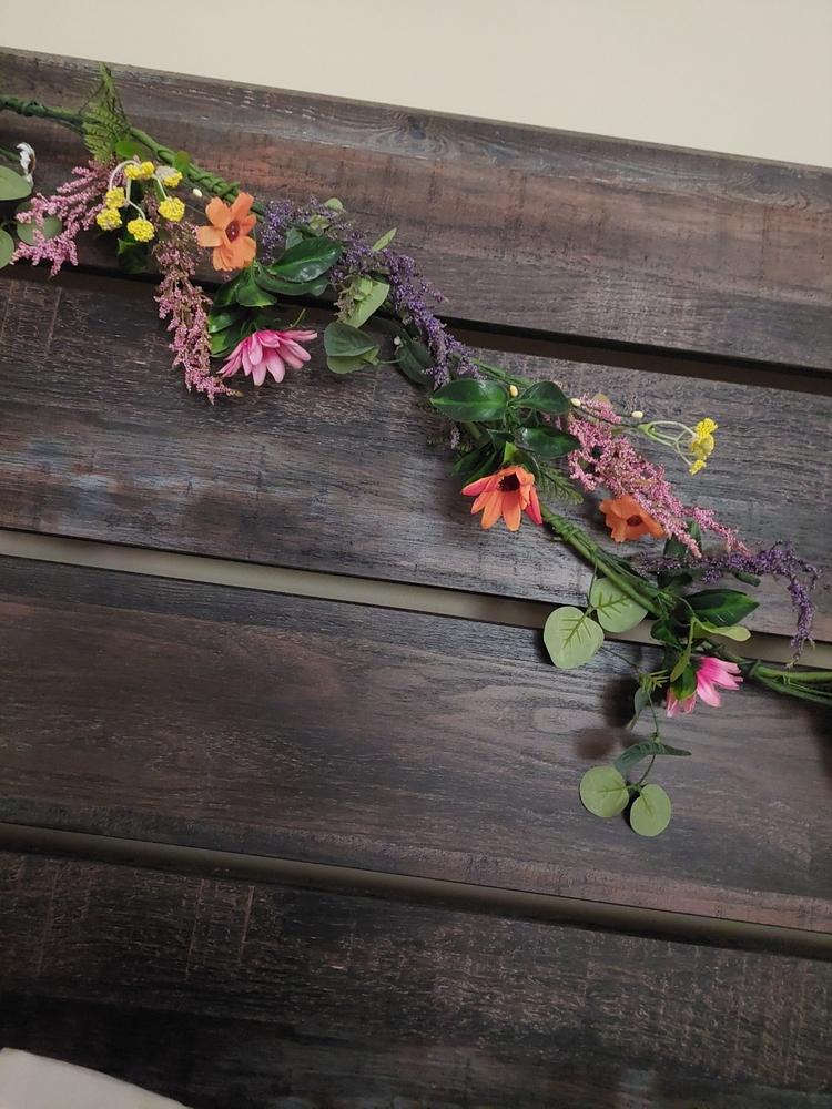 Beautiful colorful wildflower garland perfect for an outdoor