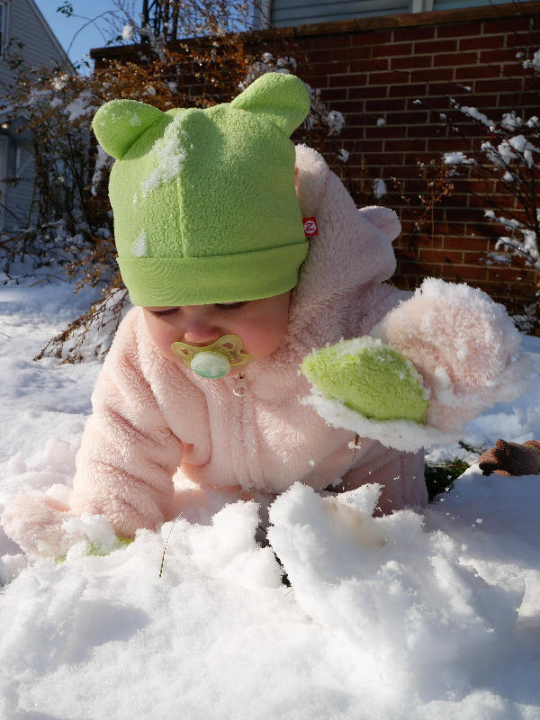 zutano mittens on a string