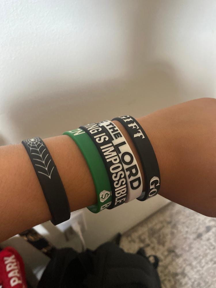 10 X $5 Mystery Wristbands (No refunds - No exchanges - Up to 10 different designs)
