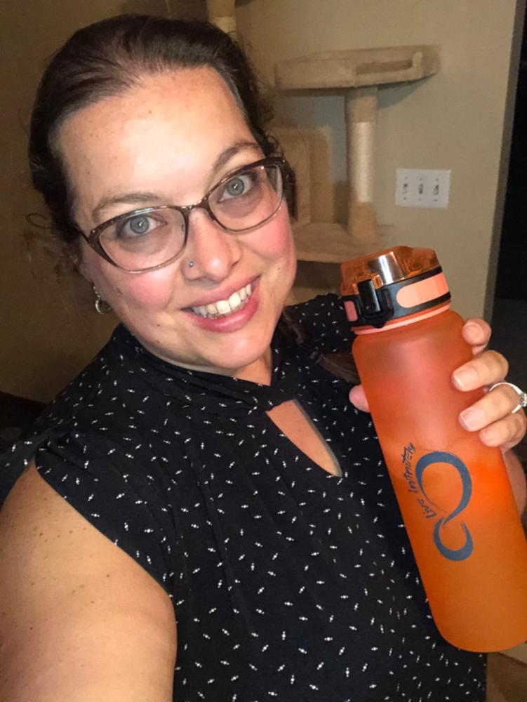 34oz Sports Water Bottle with Fruit Infuser, Time Markings & Shaker Ball - Customer Photo From Jill-Ann Guyette