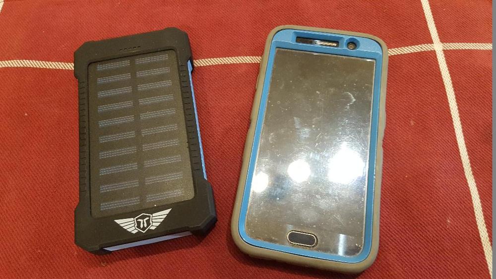 Portable 10,000mAH Waterproof / Shockproof Solar Dual-USB Charger and LED Light - Customer Photo From Boyd L.