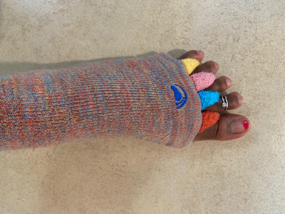 Sore, tired feet find relief with Cute Pink Foot Alignment Socks