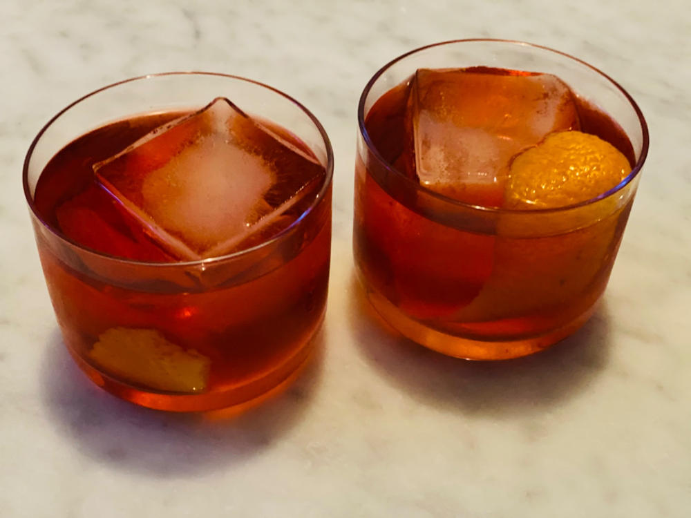 Negroni with Big Ice Cube and Saffron on Top in Vintage Glass Stock Image -  Image of vintage, whiskey: 217568501