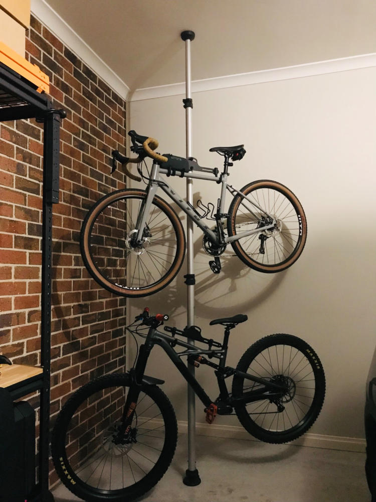 Bike stand fashion floor to ceiling