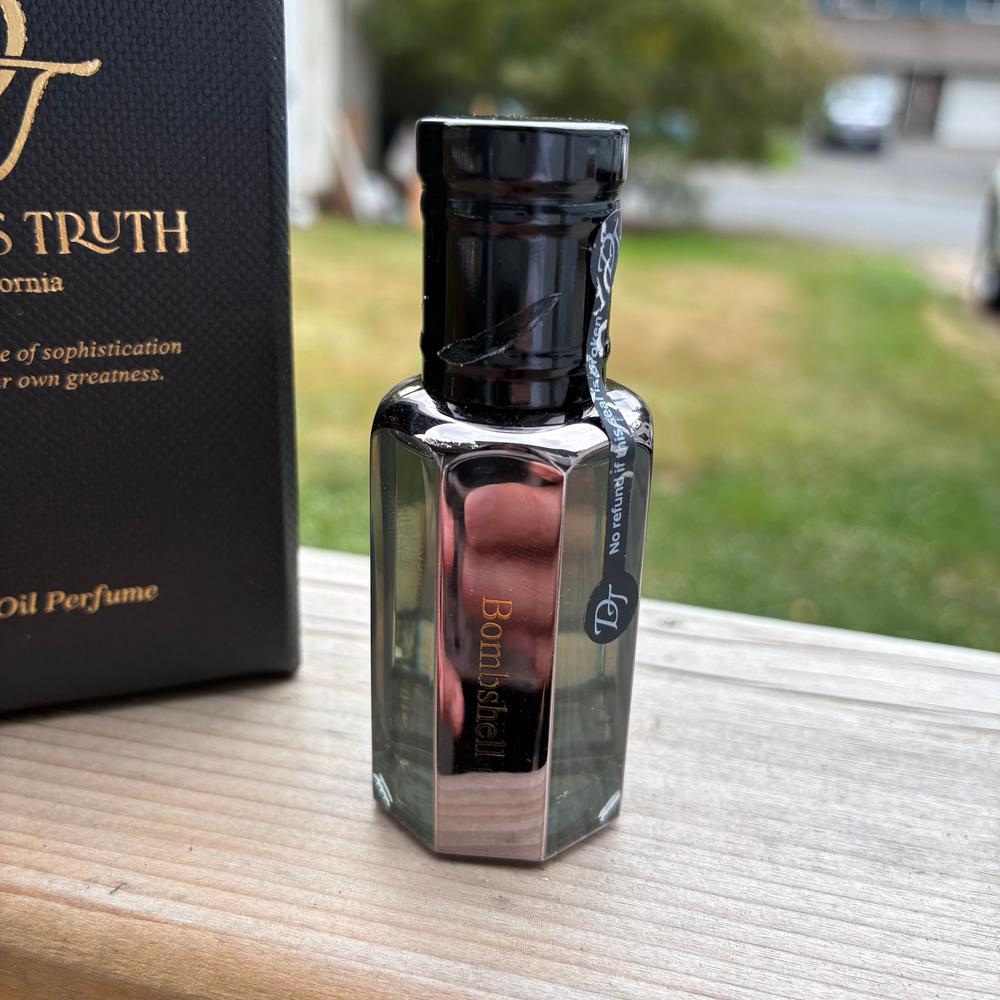 Daniel's truth bombshell 香水　oil perfume Amazon.com : Daniel's Truth Roll-On Essential Oil Perfume