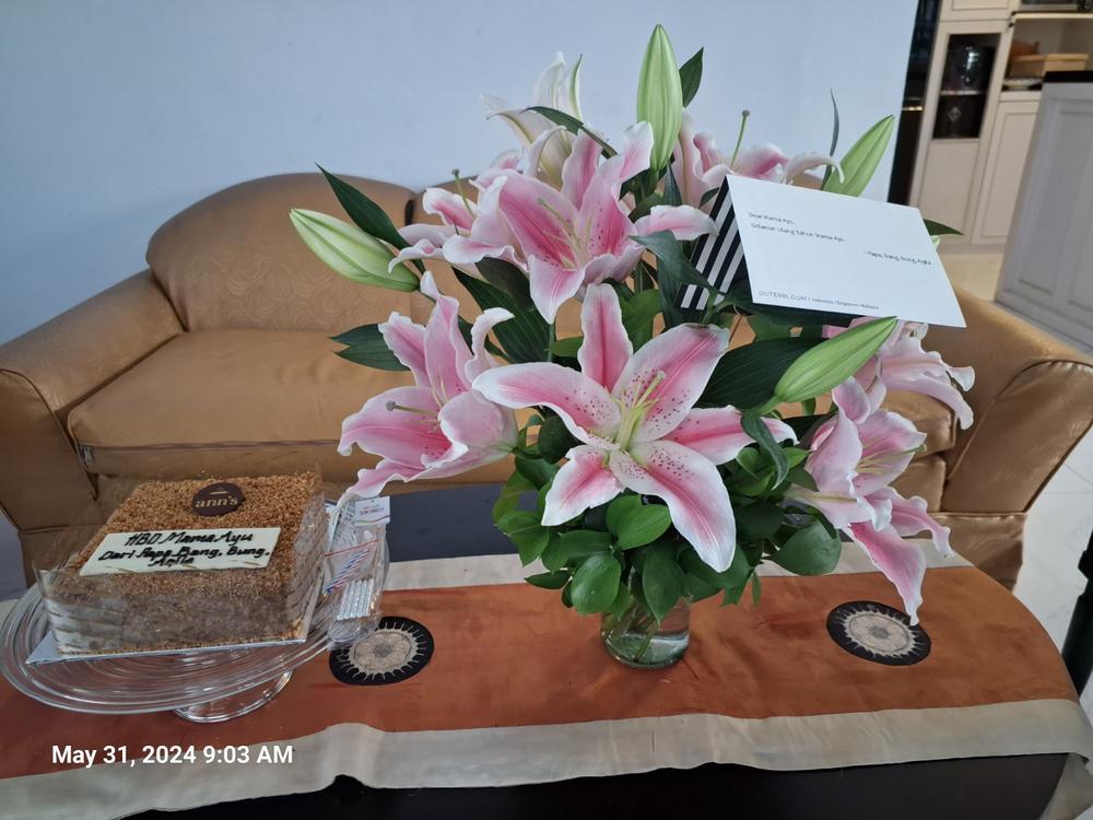 Table Arrangement Of Pink Lilies And Greens in Vase - Customer Photo From Syarif Lubis
