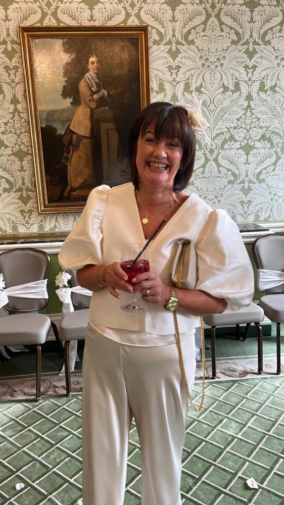 Spinning Disc Necklace (Gold) - Customer Photo From Margaret Moynihan