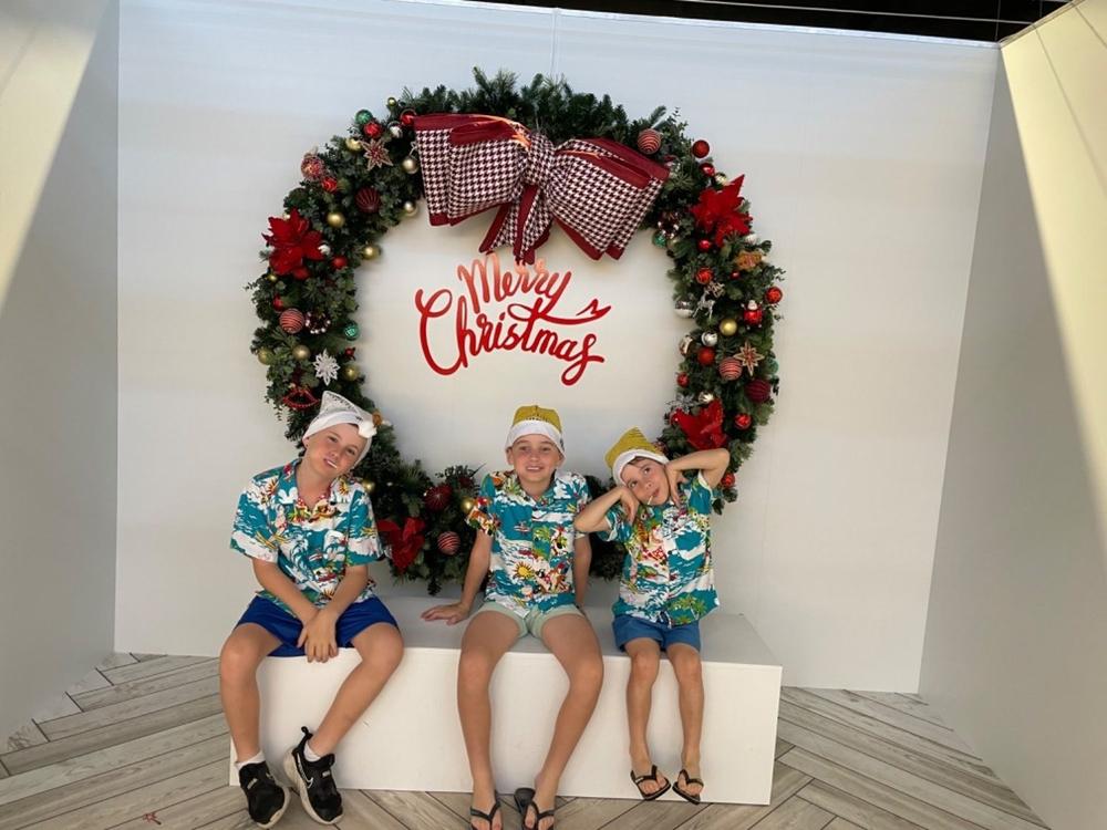 Blue Surfing Santa - Boys Christmas Shirt - Customer Photo From Louise Farnill