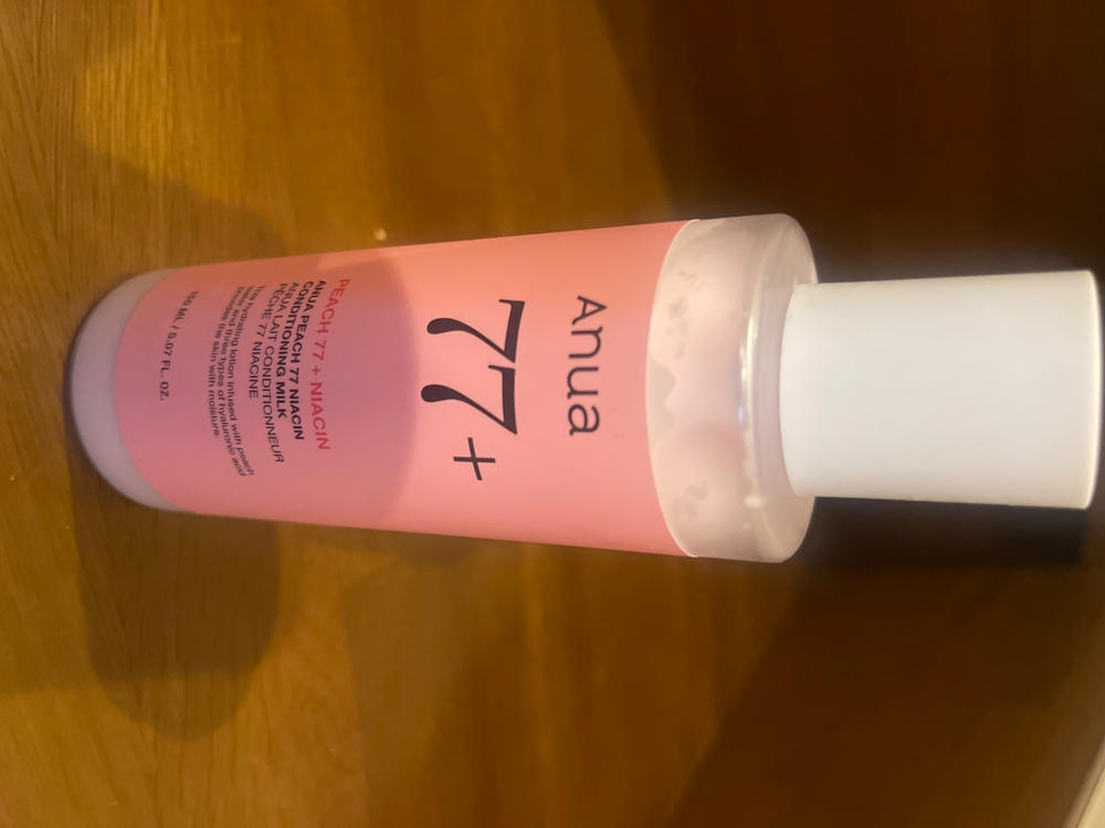 桃77ナイアシンコンディショニングミルク 150ml– アヌア Anua