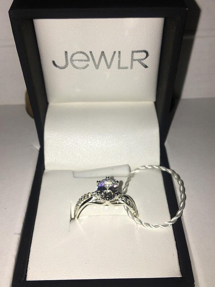 Sterling Silver Oval Cut Gemstone Ring with Twisted Band and