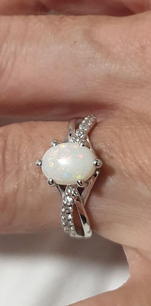 Sterling Silver Oval Cut Gemstone Ring with Twisted Band and