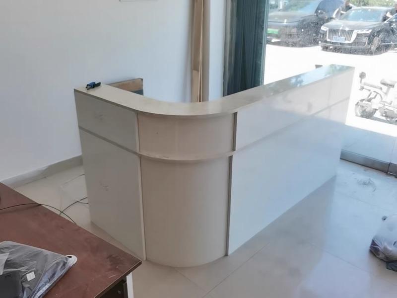 Minimalist Curved Checkout Counters for Retail Shop - Customer Photo From Lily Evans