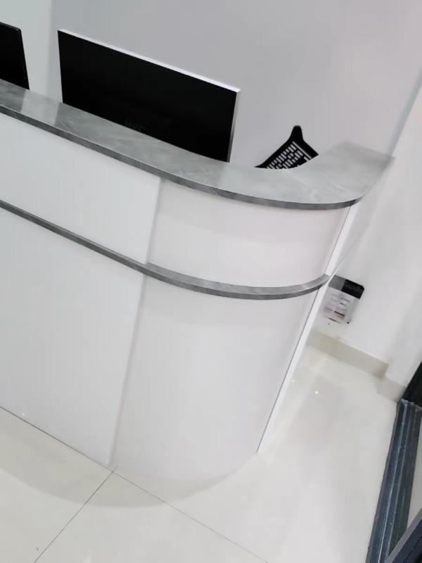 Minimalist Curved Checkout Counters for Retail Shop - Customer Photo From James Adams