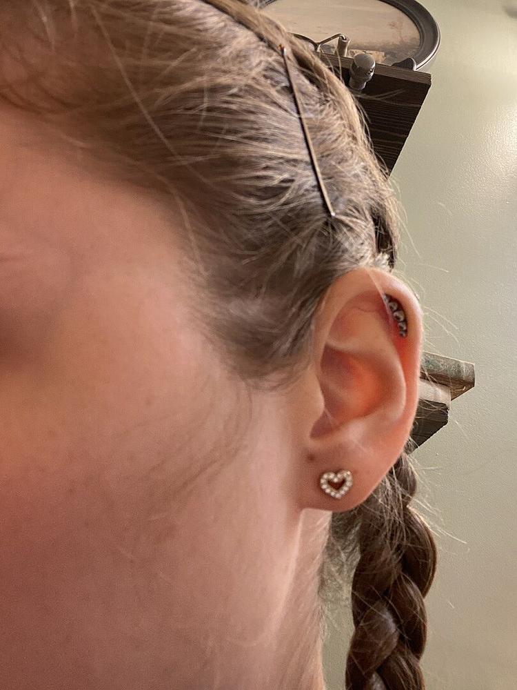 Golden Titanium 8mm Brilliance Heart Hollow Earrings - Customer Photo From Gabrielle D.