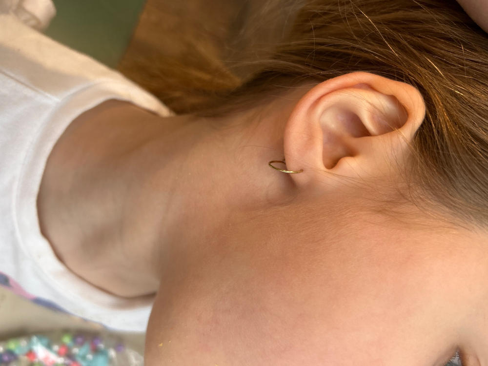 Golden Titanium Ear Rings - Customer Photo From Amy DiOrio