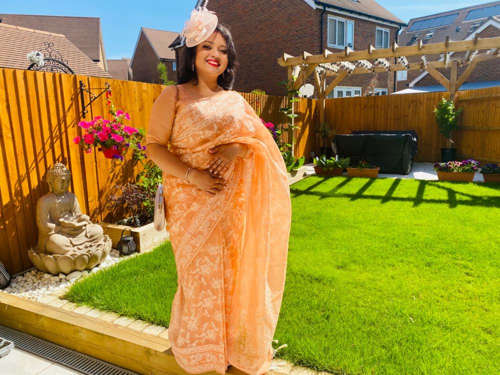 Wispy Feather & Twisted Sinamay Peach Disc Fascinator - Customer Photo From Sujata Das